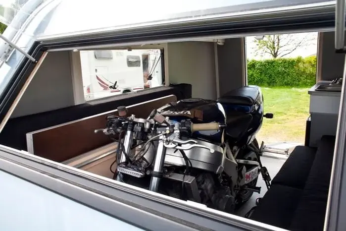 Naked bike in motor caravan